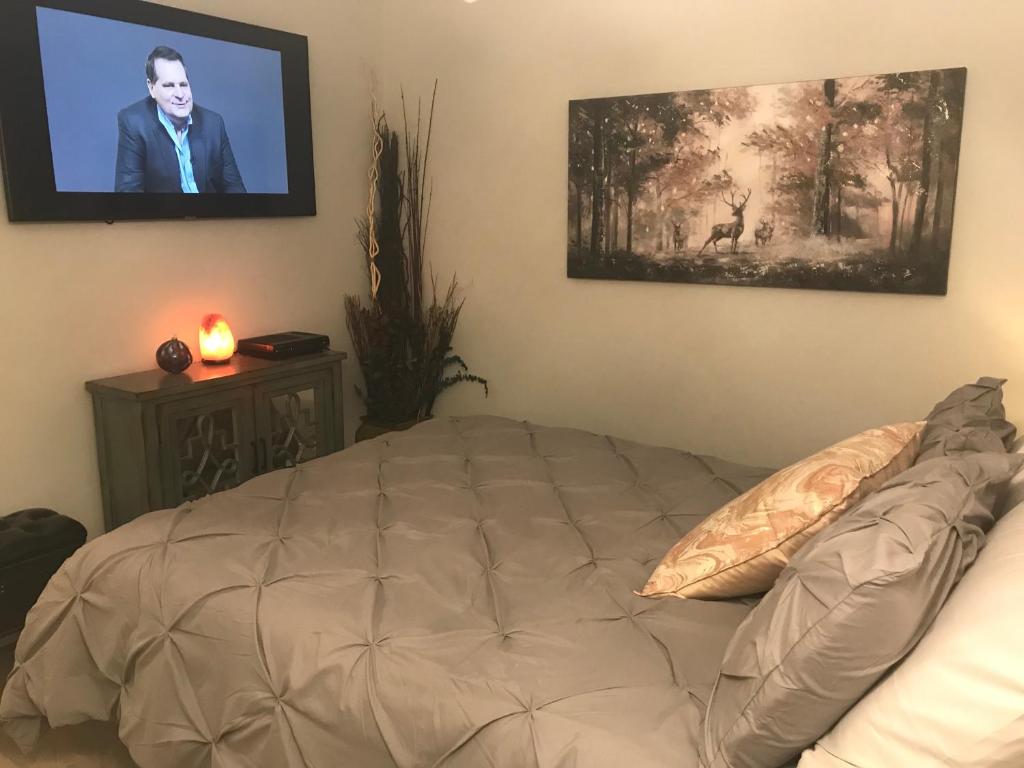 Postel nebo postele na pokoji v ubytování Home Sweet Condo