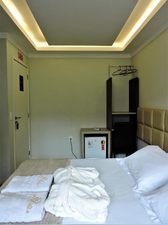 Postel nebo postele na pokoji v ubytování Pousada Bela By Bia
