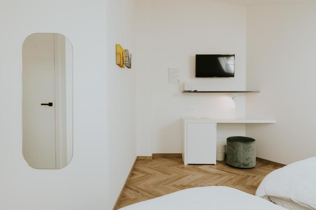 Postel nebo postele na pokoji v ubytování Hotel Jerom