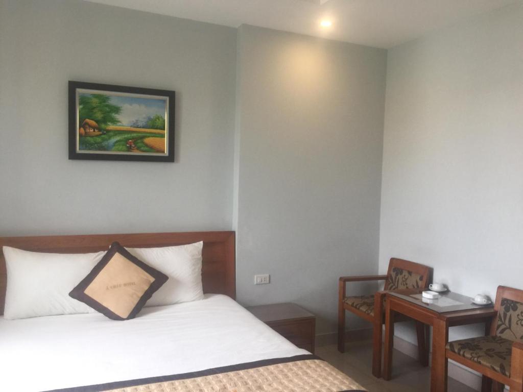 Postel nebo postele na pokoji v ubytování Green Hotel