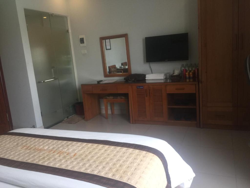 TV a/nebo společenská místnost v ubytování Green Hotel