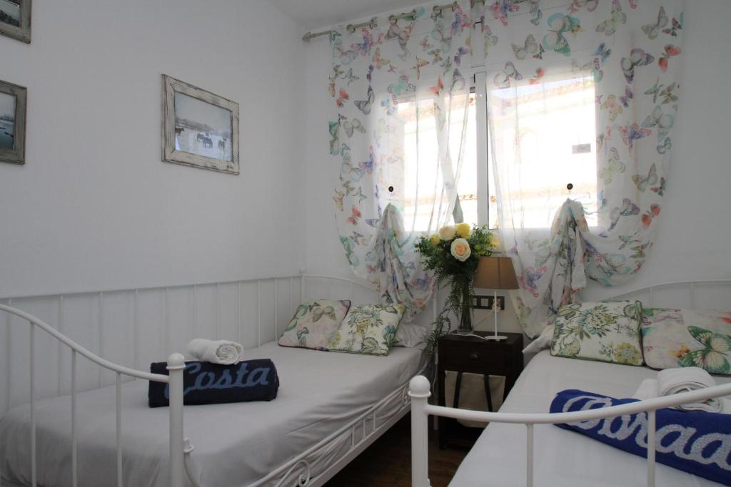 Posteľ alebo postele v izbe v ubytovaní ARENDA Villa Flandes Pino Alto