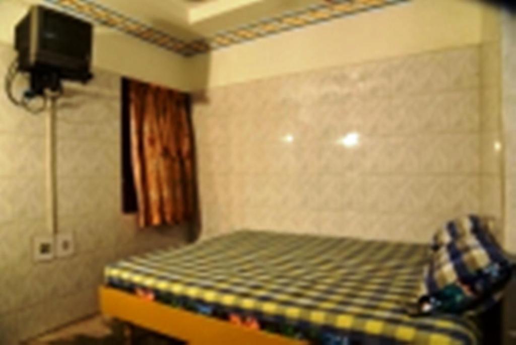 Postel nebo postele na pokoji v ubytování Perfect Guest House
