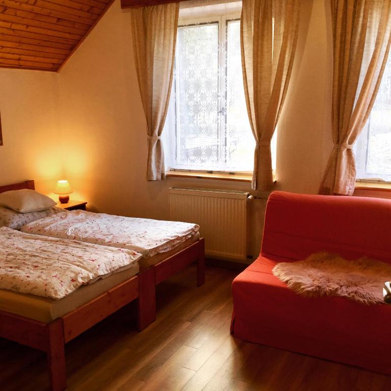 Postel nebo postele na pokoji v ubytování Chalupa Václav Lipno