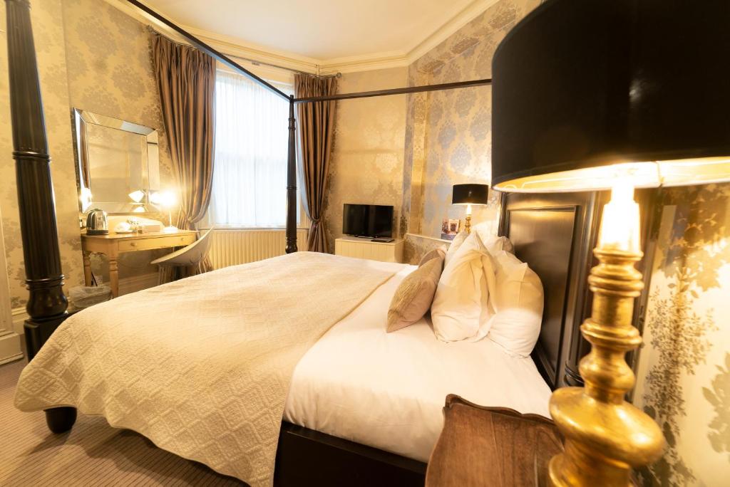 Postel nebo postele na pokoji v ubytování Brooks Guesthouse