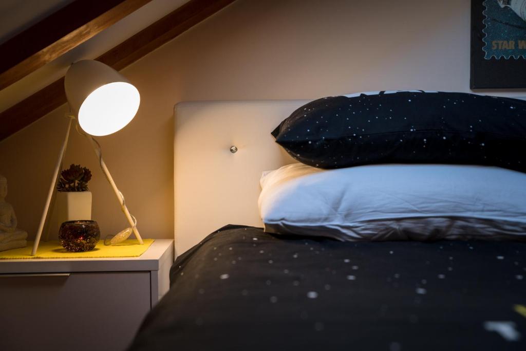 Posteľ alebo postele v izbe v ubytovaní Apartments Pina