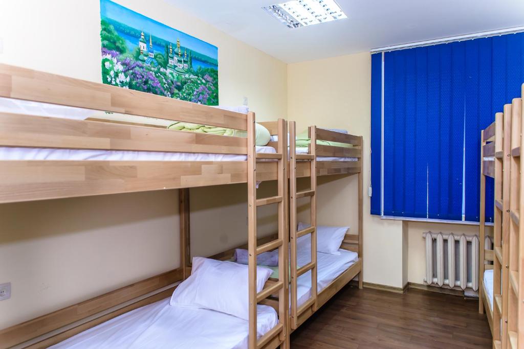 Postel nebo postele na pokoji v ubytování BOTANIC GLOBUS HOSTEL