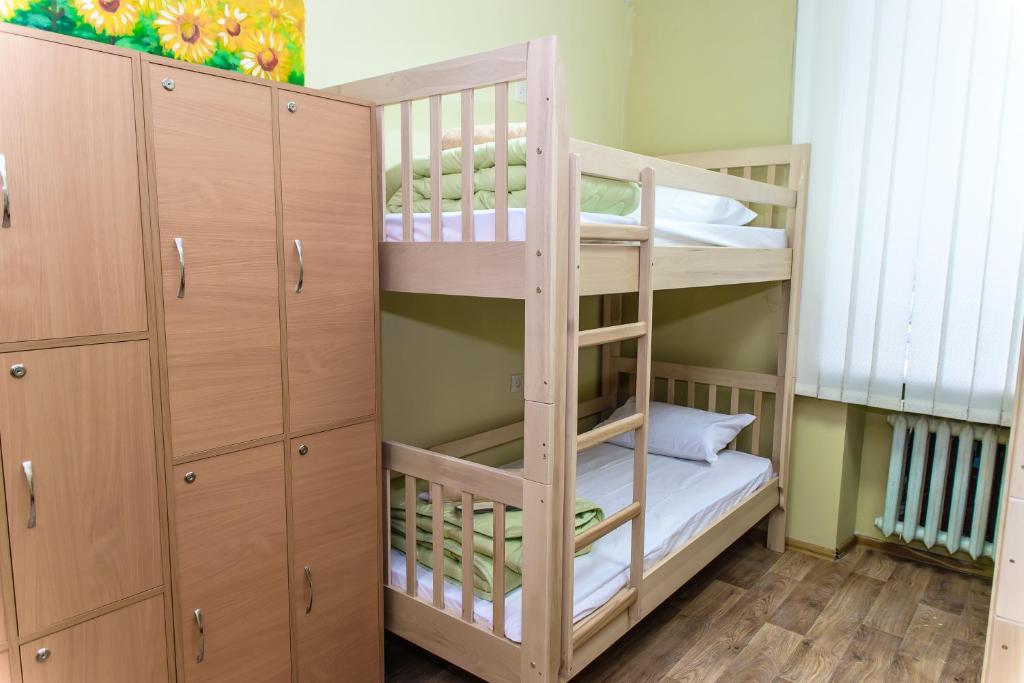 Postel nebo postele na pokoji v ubytování BOTANIC GLOBUS HOSTEL