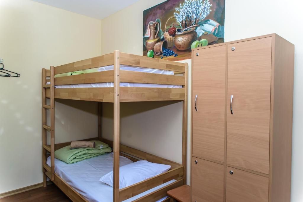 Postel nebo postele na pokoji v ubytování BOTANIC GLOBUS HOSTEL