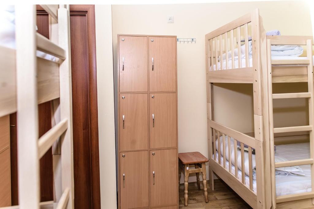 Postel nebo postele na pokoji v ubytování BOTANIC GLOBUS HOSTEL