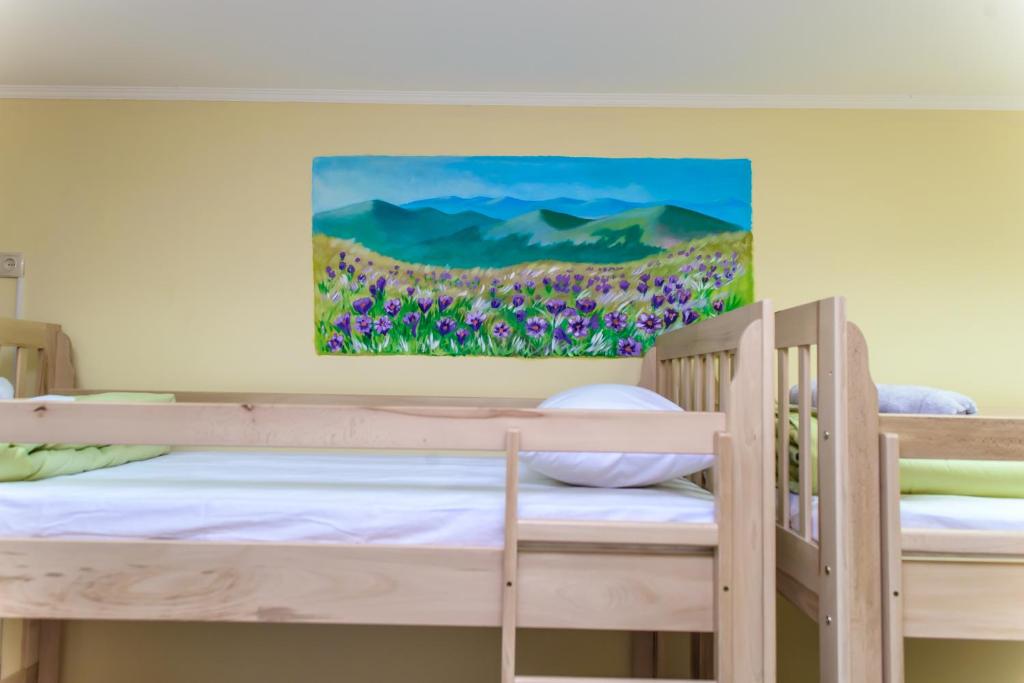 Postel nebo postele na pokoji v ubytování BOTANIC GLOBUS HOSTEL