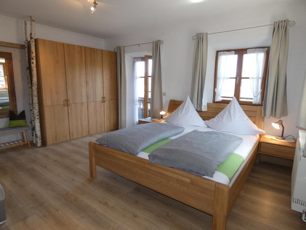 Postel nebo postele na pokoji v ubytování Apartments Donebauer