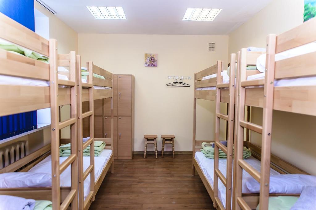 Postel nebo postele na pokoji v ubytování BOTANIC GLOBUS HOSTEL