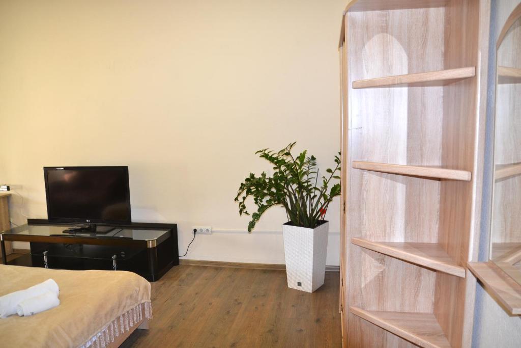TV a/nebo společenská místnost v ubytování Coin Apartments & Poshtel