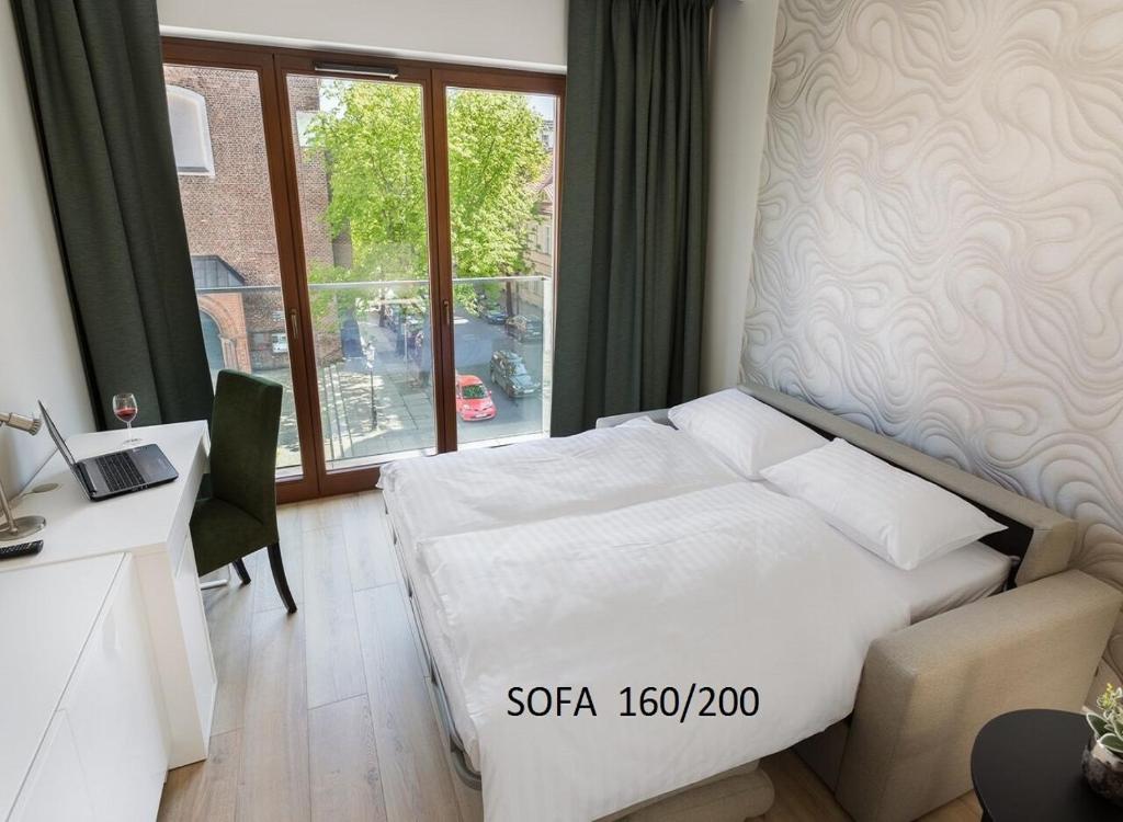 Posteľ alebo postele v izbe v ubytovaní Liza Lux Apartments I Old Town