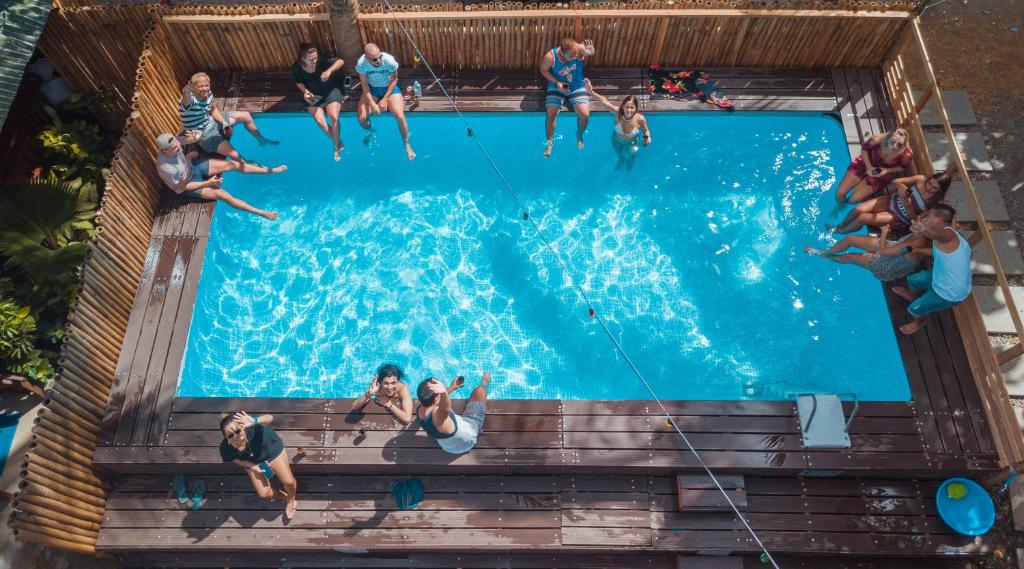 a group of people in a swimming pool at Frendz Hostel Boracay in Boracay