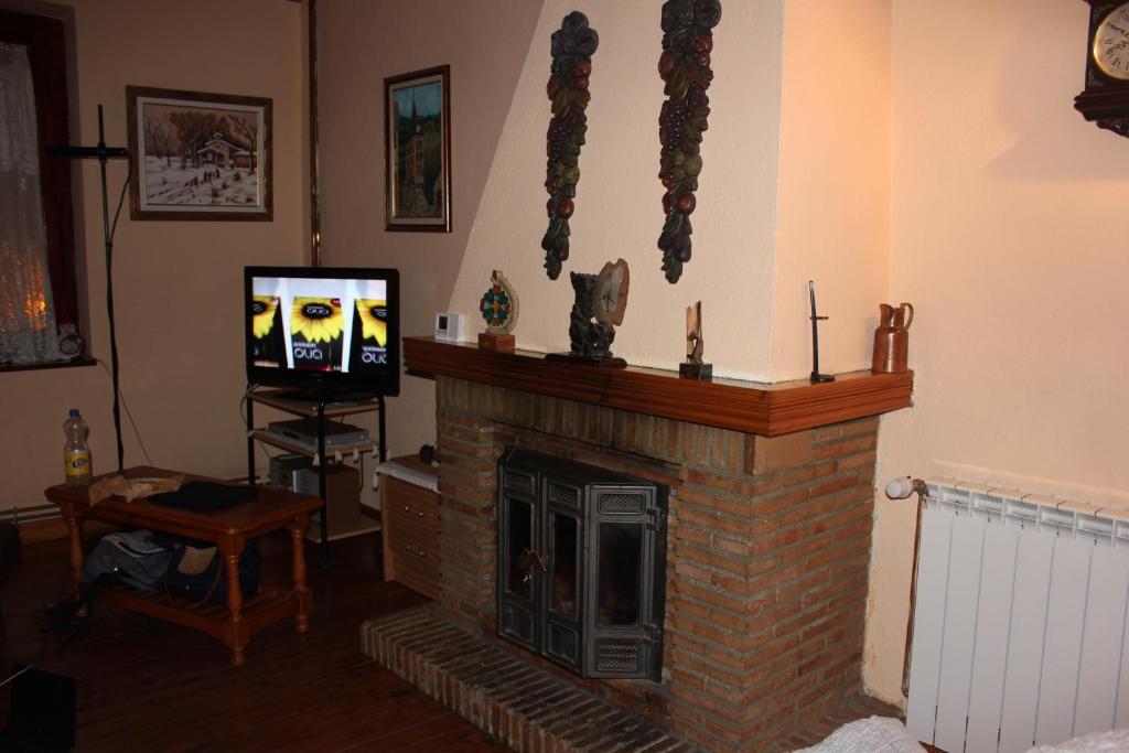 TV a/nebo společenská místnost v ubytování Casa Aranesa