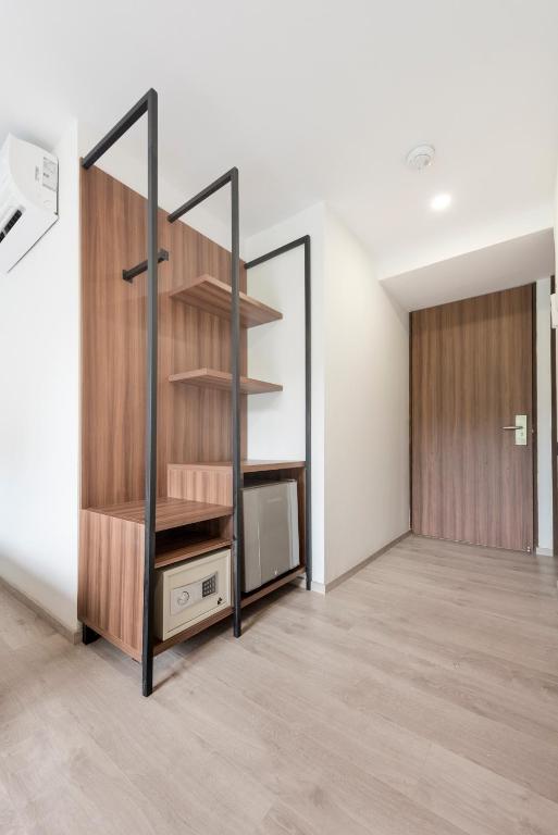 Postel nebo postele na pokoji v ubytování Foresta Hotel