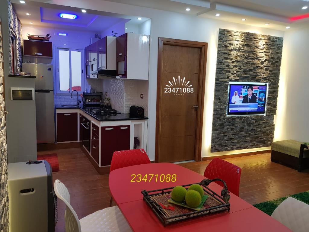 Kuchyň nebo kuchyňský kout v ubytování APPARTEMENT "DINA" Kélibia