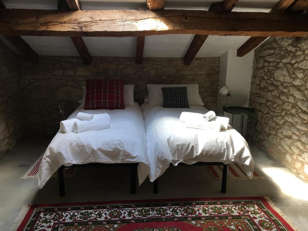 Postel nebo postele na pokoji v ubytování Sotto I Sassi
