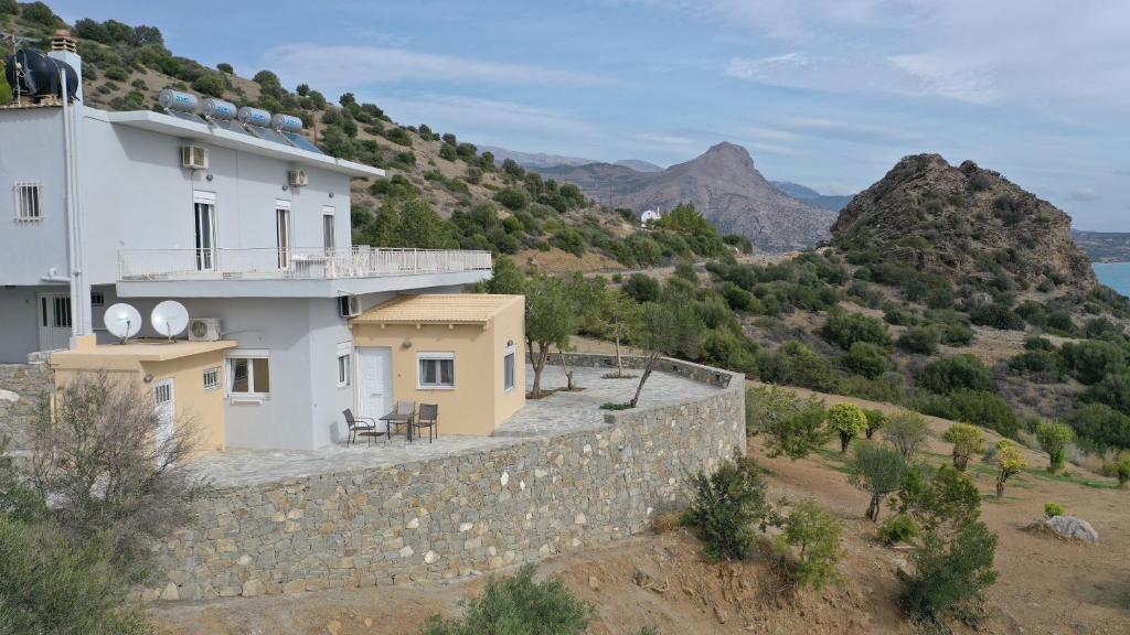 a building on top of a stone wall at Skouros Villa in Kastrí