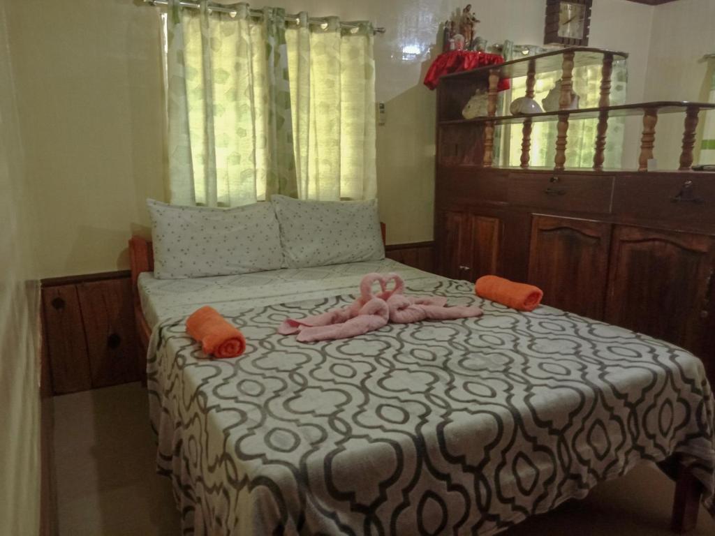 Postel nebo postele na pokoji v ubytování Pitaya Native Guest House