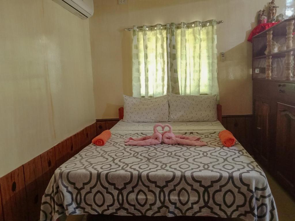 Postel nebo postele na pokoji v ubytování Pitaya Native Guest House
