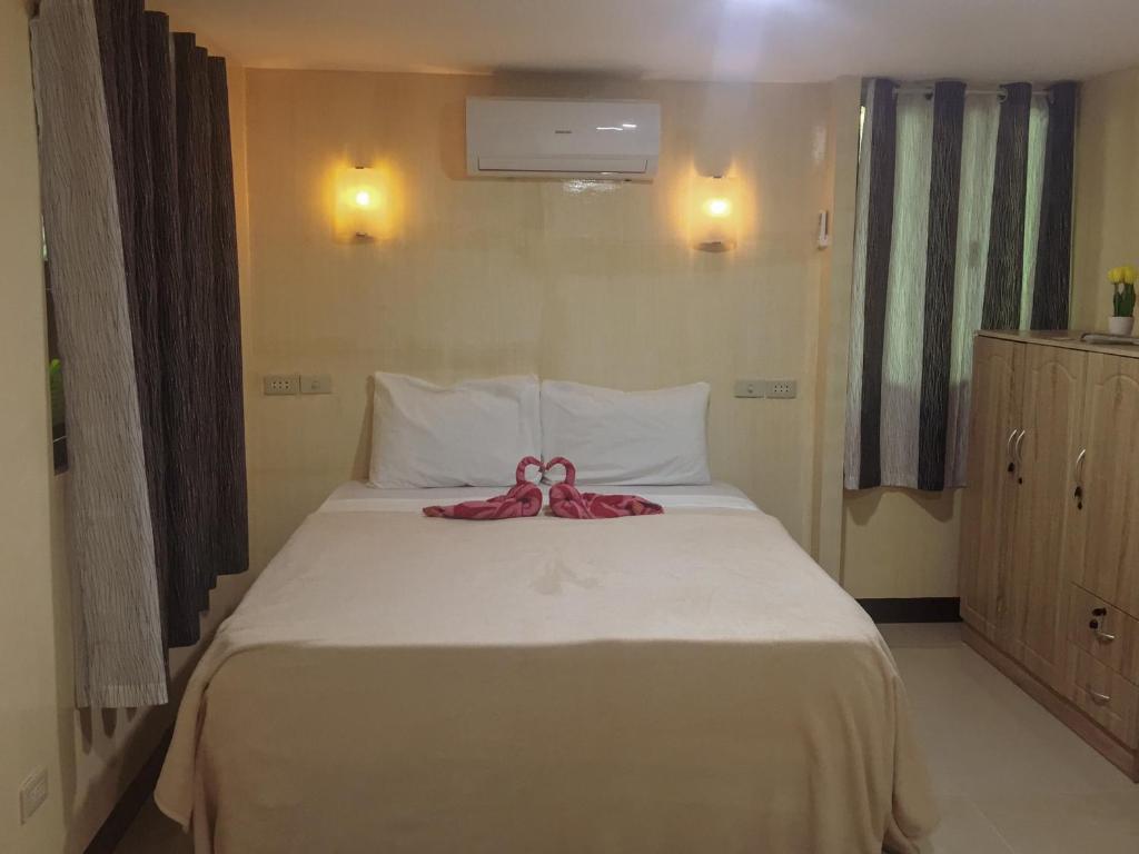 Postel nebo postele na pokoji v ubytování Pitaya Native Guest House