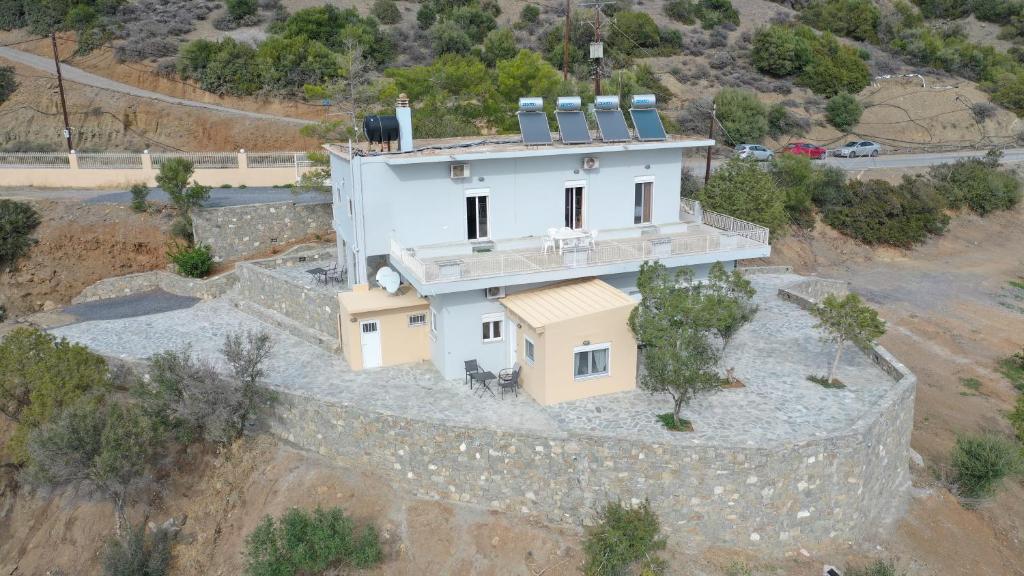 an aerial view of a house on a wall at Skouros Villa in Kastrí