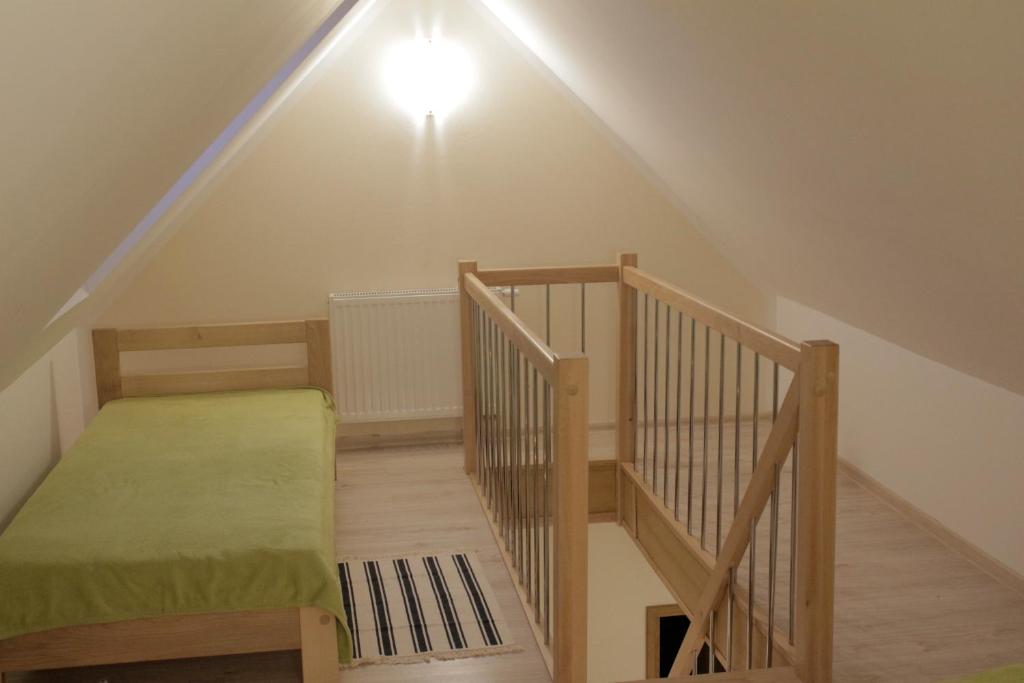 Posteľ alebo postele v izbe v ubytovaní Apartamenty Nad Górską Rzeką