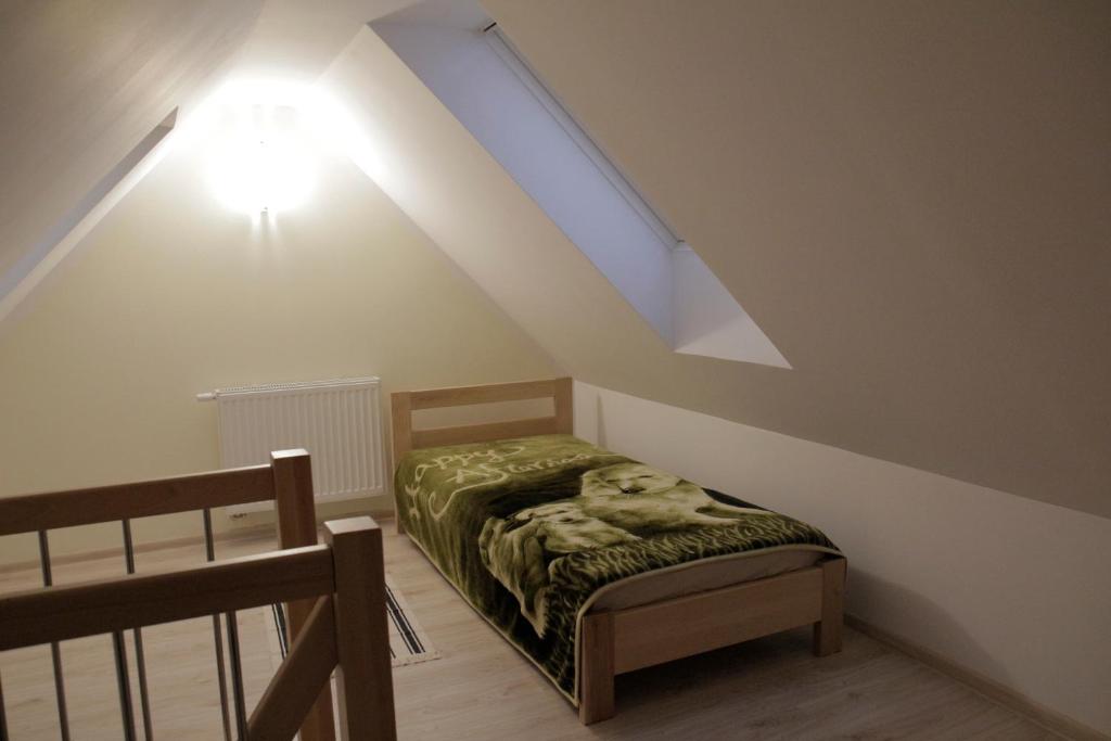 Posteľ alebo postele v izbe v ubytovaní Apartamenty Nad Górską Rzeką
