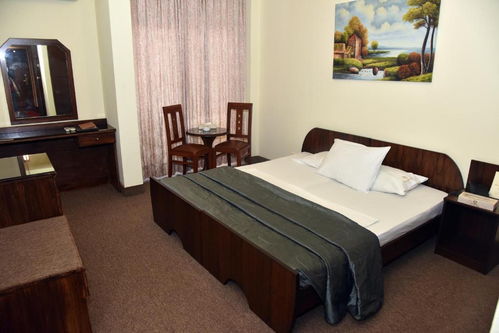 Cama o camas de una habitación en Grand Gabriel