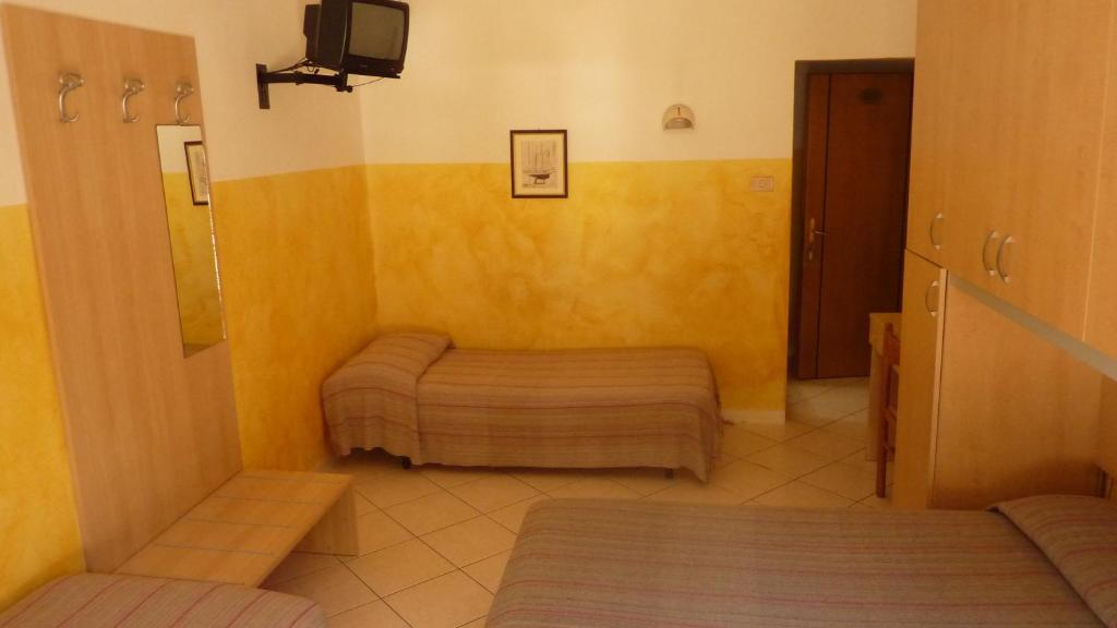 Postel nebo postele na pokoji v ubytování Hotel Canova