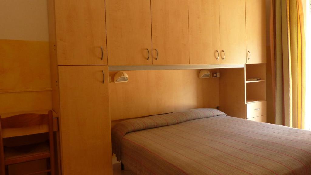 Postel nebo postele na pokoji v ubytování Hotel Canova