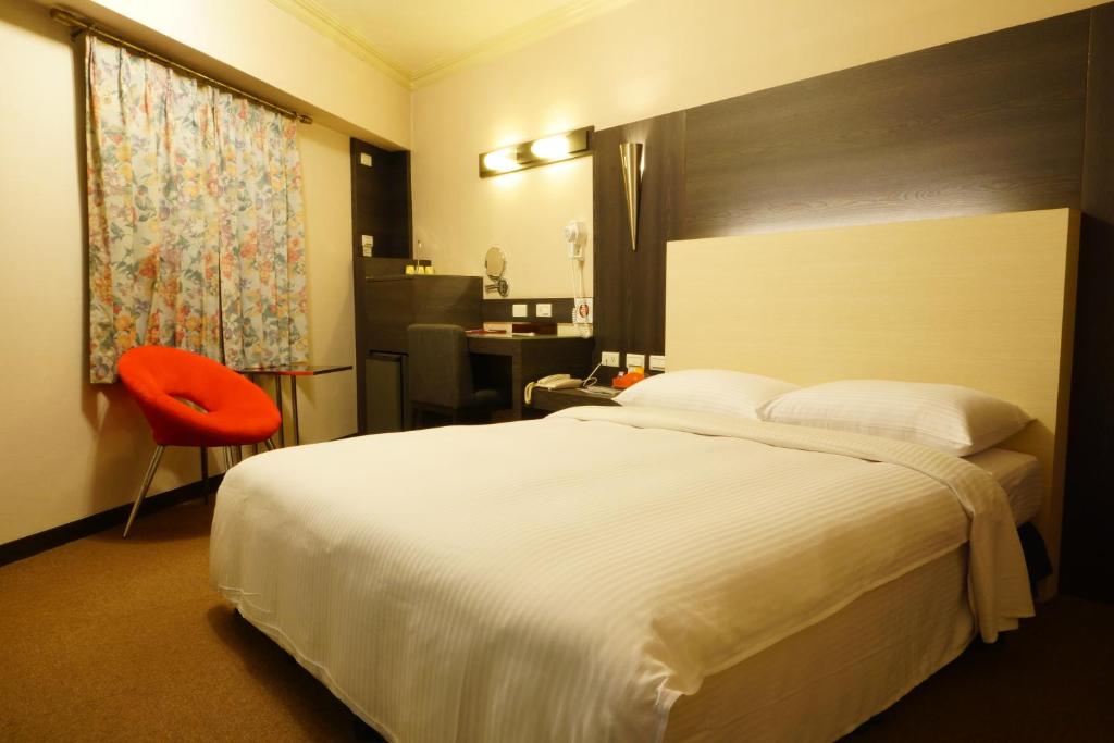 Postel nebo postele na pokoji v ubytování Ying Dai Hotel