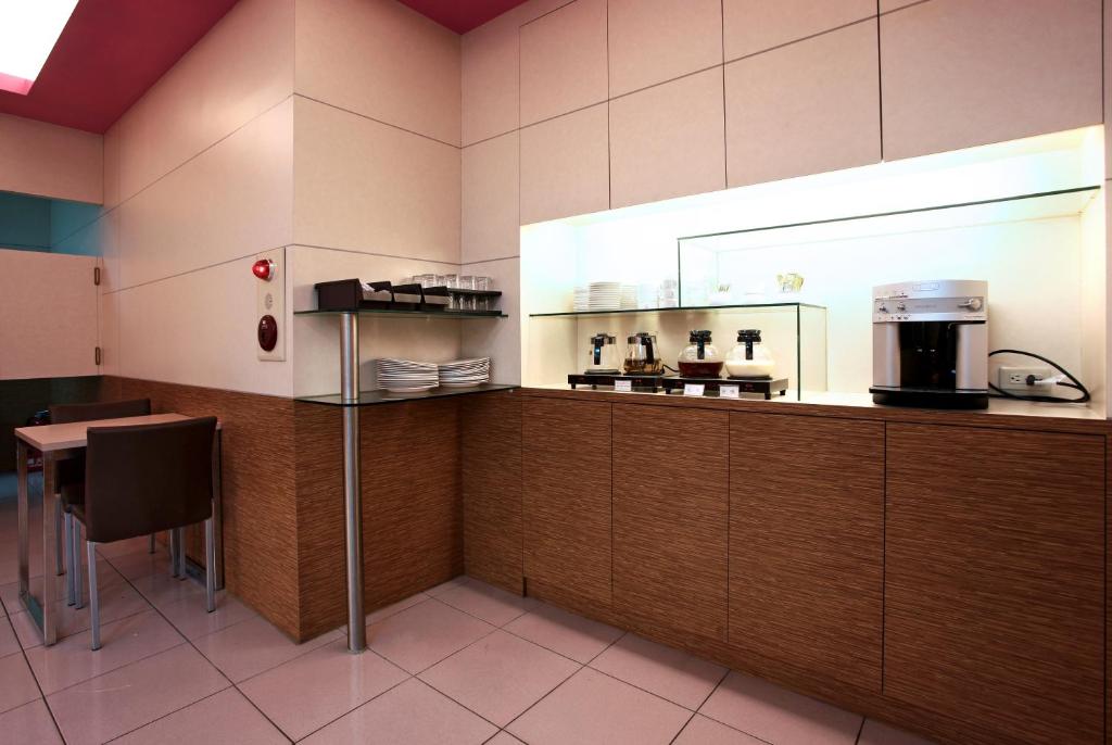 Kuchyň nebo kuchyňský kout v ubytování Ying Dai Hotel