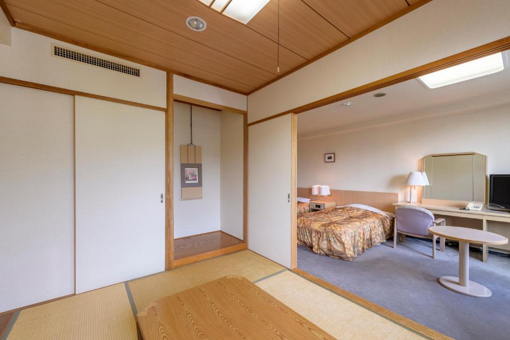 TV a/nebo společenská místnost v ubytování Hotel Tagawa