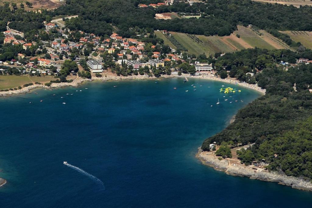 an aerial view of a lake with boats in it at Apartments villa MaVeRo in Banjole