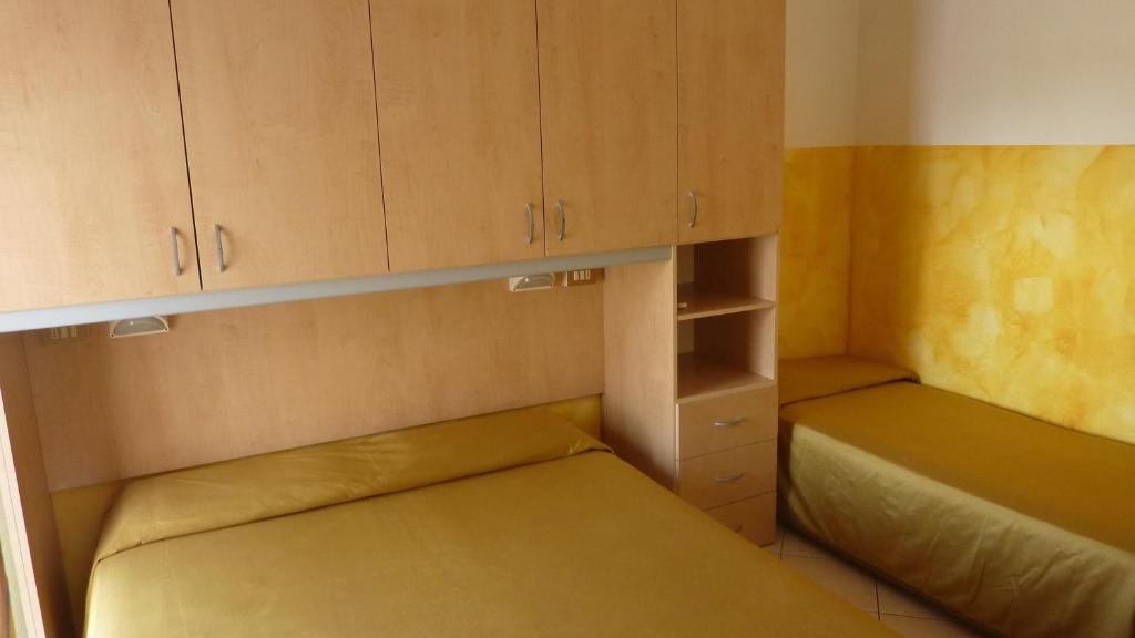 Postel nebo postele na pokoji v ubytování Hotel Canova