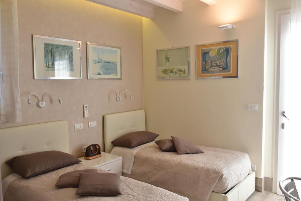 A bed or beds in a room at Bed & Breakfast Case Osti