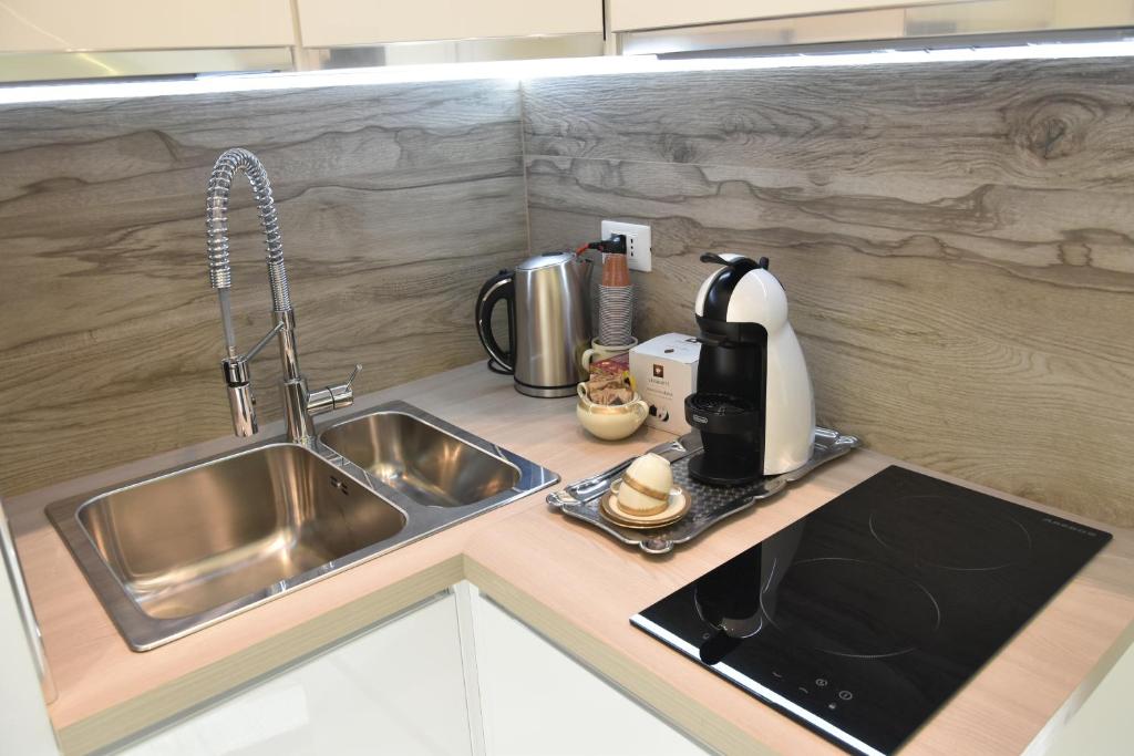A kitchen or kitchenette at Bed & Breakfast Case Osti