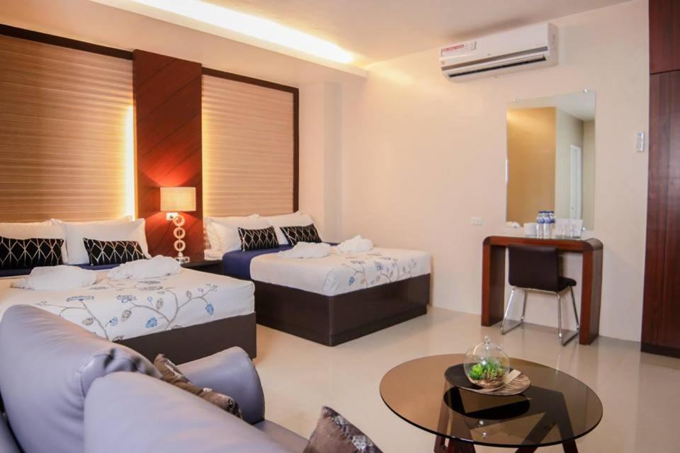 Postel nebo postele na pokoji v ubytování Mezza Hotel