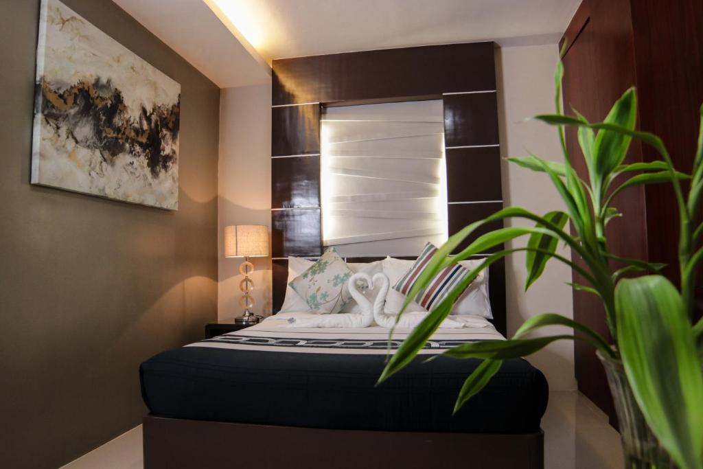 Postel nebo postele na pokoji v ubytování Mezza Hotel