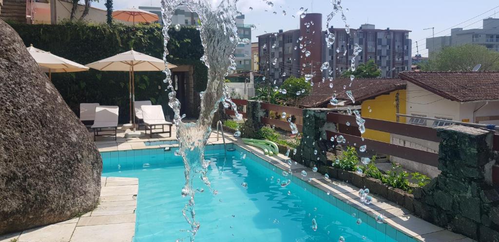 Swimming pool sa o malapit sa Apartamentos Casa da Pedra