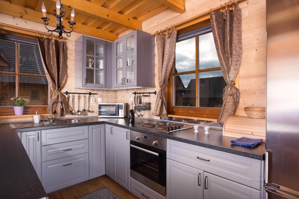 A kitchen or kitchenette at Víkendové Chalupy