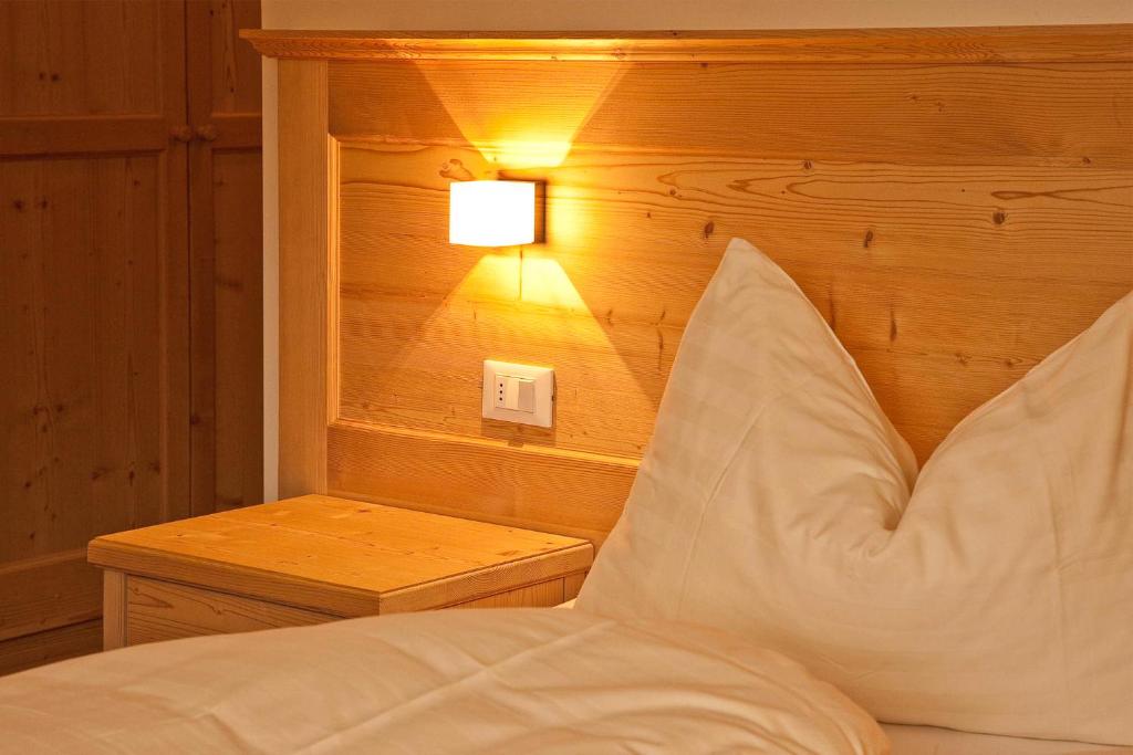 Postel nebo postele na pokoji v ubytování Hotel Waldheim