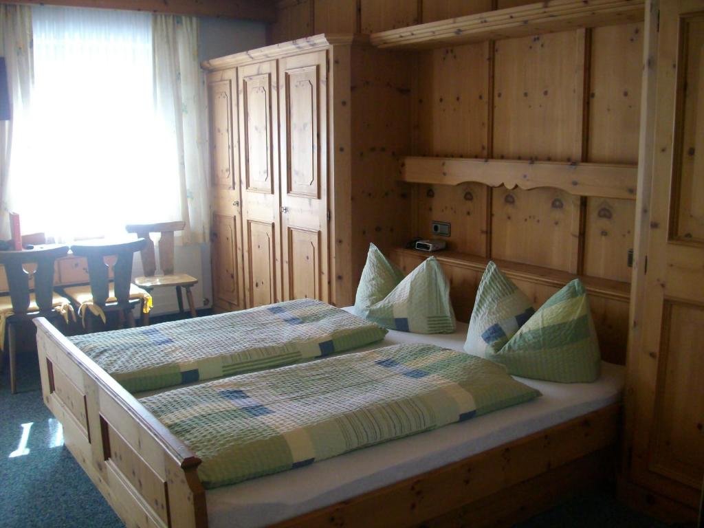 Postel nebo postele na pokoji v ubytování Gästehaus Christoph