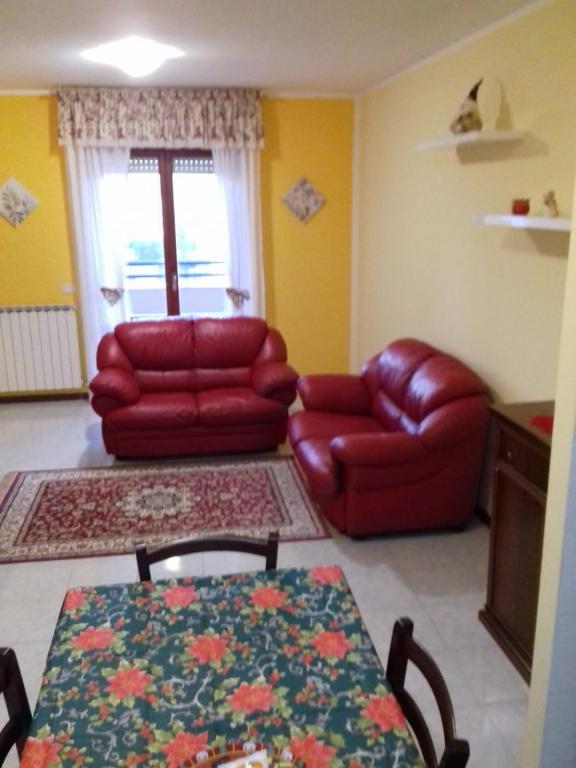 A seating area at Casa Vacanze "Ai piedi di Assisi"
