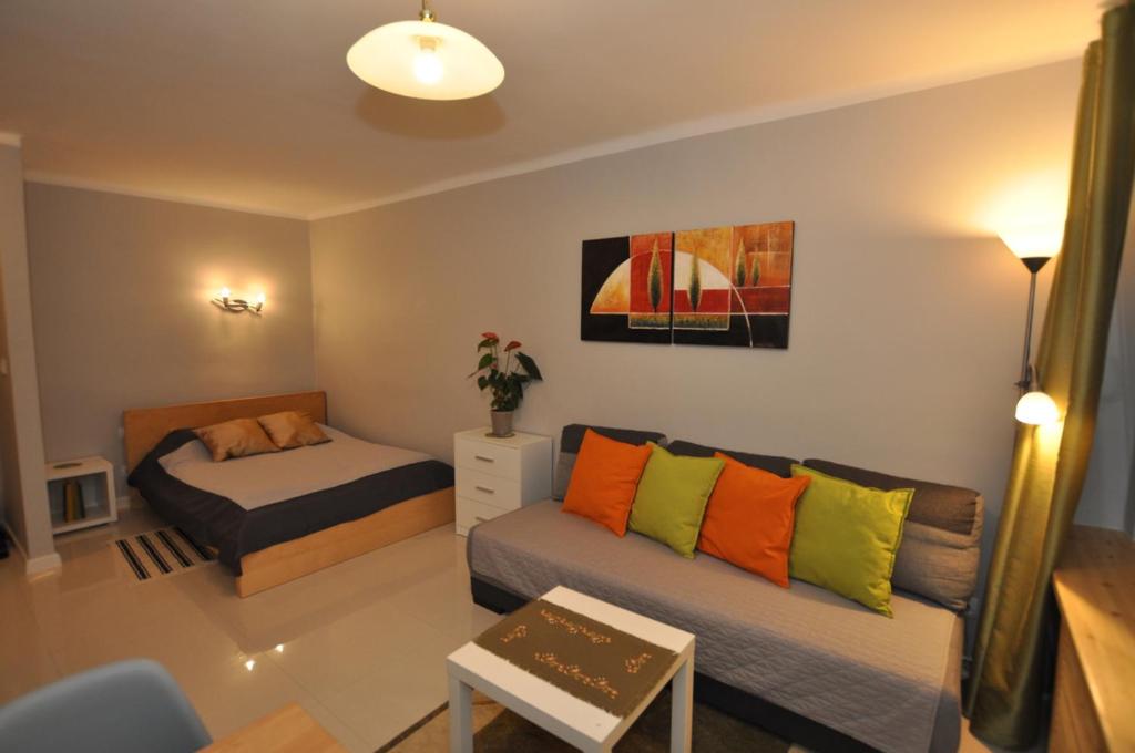 Posteľ alebo postele v izbe v ubytovaní Apartament pod Jasną Górą
