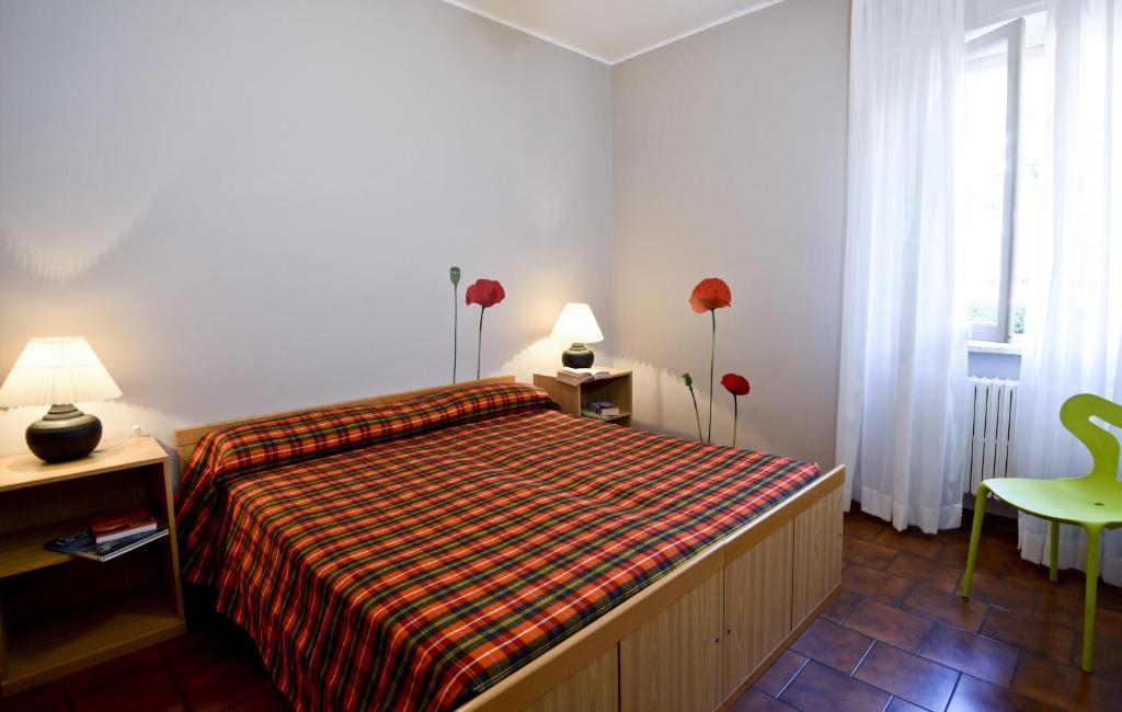 Postel nebo postele na pokoji v ubytování Residence Orchidea